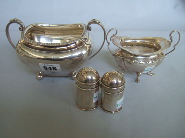 Appraisal: Silver comprising a twin handled sugar bowl raised on bun