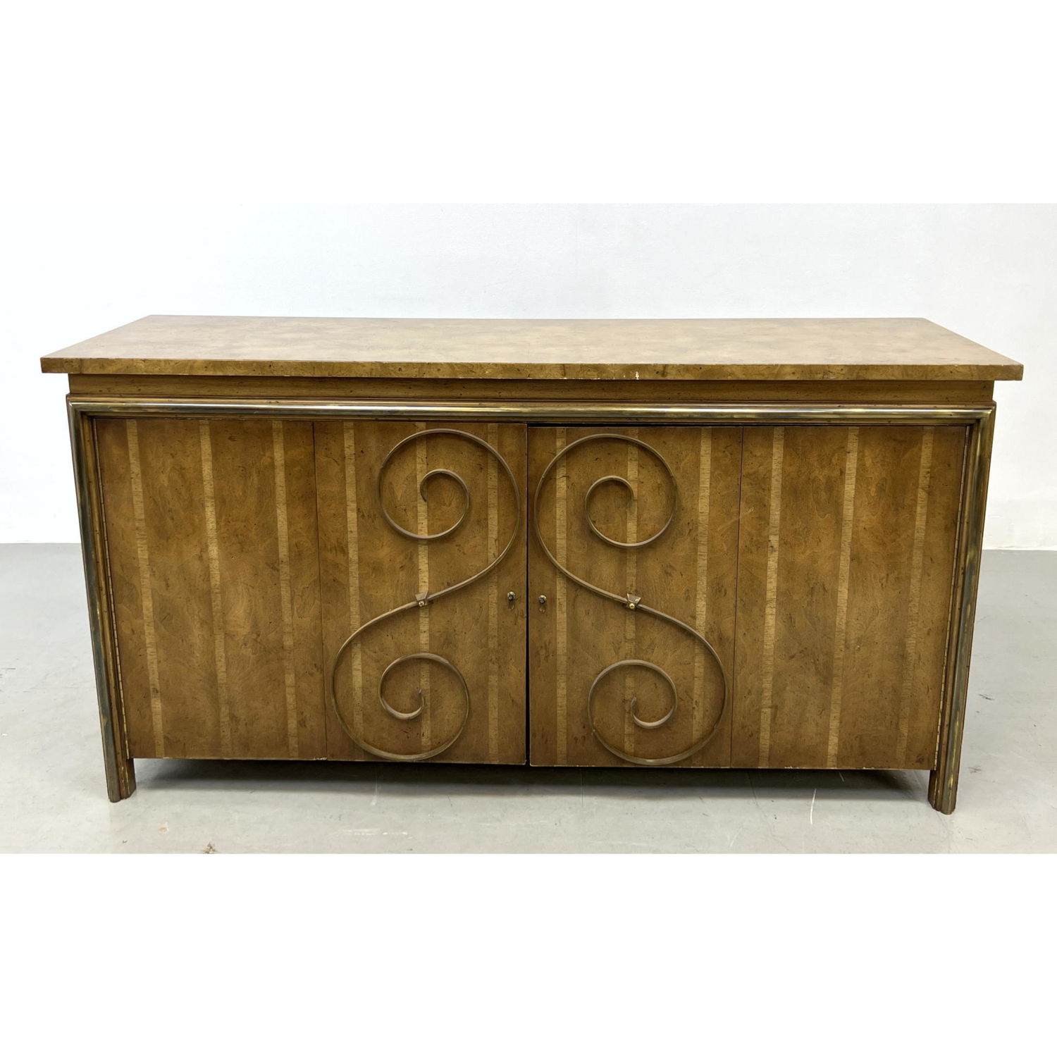 Appraisal: Burl Wood Top Credenza Brass Scroll detail on Bi-Fold Doors