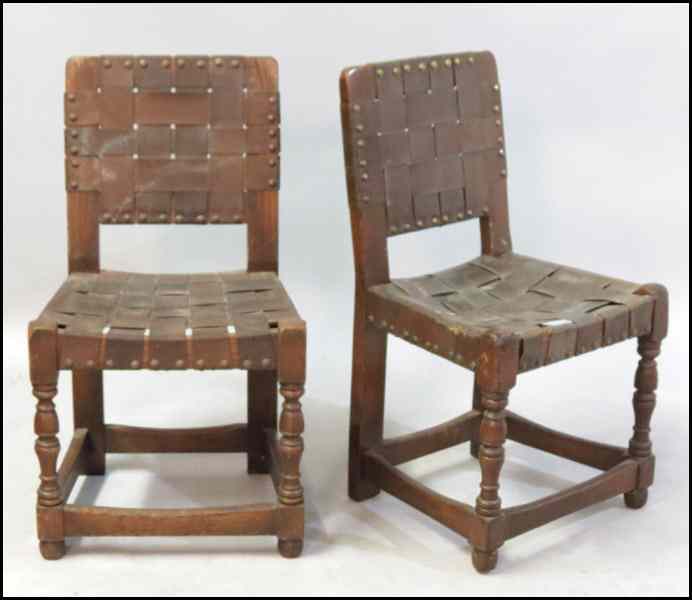 Appraisal: PAIR OF OAK AND LEATHER SIDE CHAIRS Height '' Condition