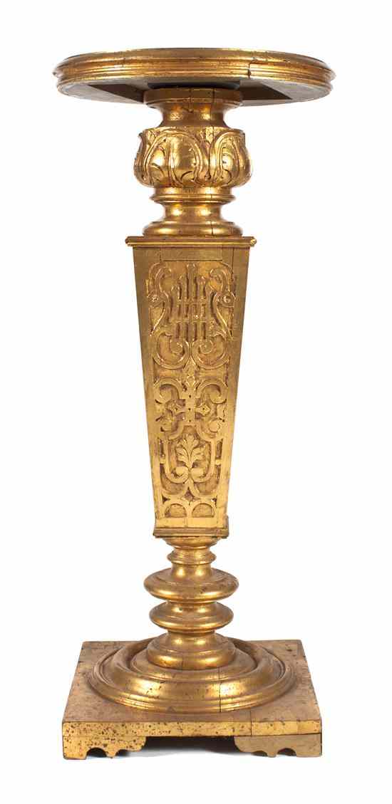 Appraisal: A Neoclassical Giltwood Pedestal having a circular top above the