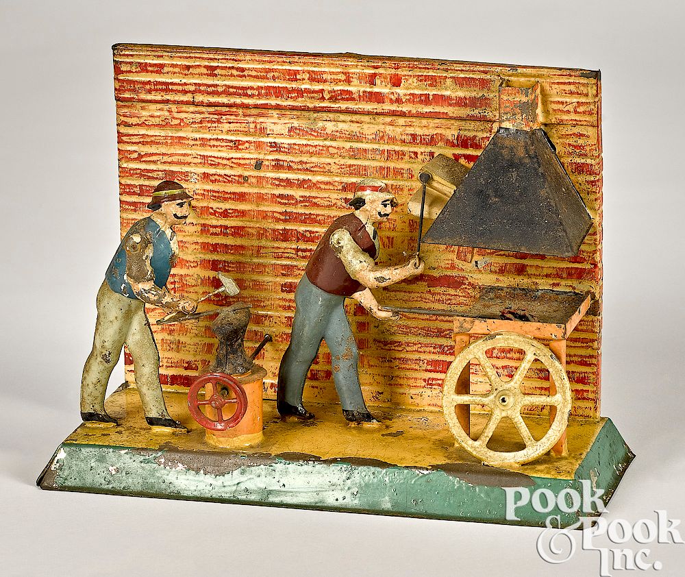 Appraisal: Painted tin blacksmith shop steam toy accessory Painted tin blacksmith