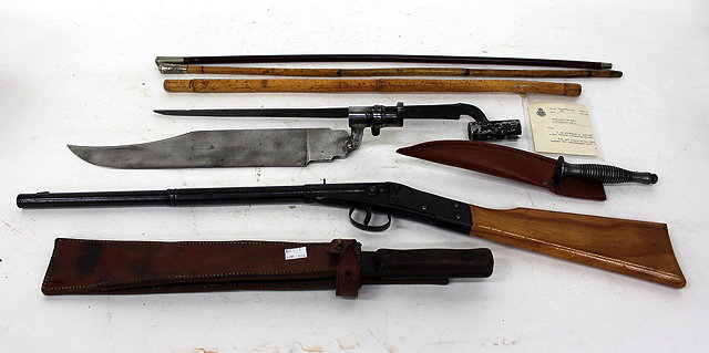 Appraisal: THREE SWAGGER STICKS a World War II square end machete