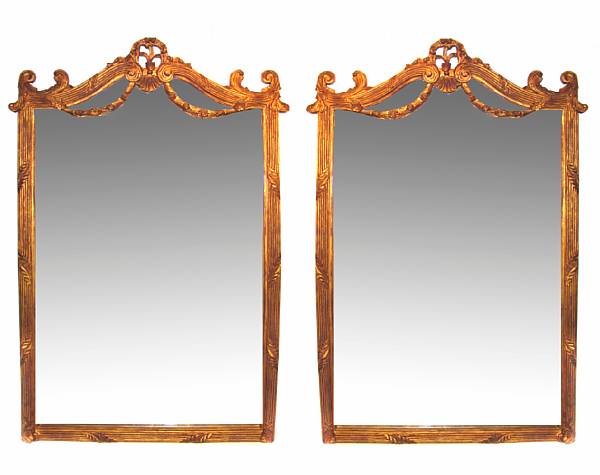 Appraisal: A pair of Louis XVI style mirrors height ft in