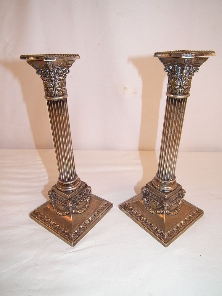 Appraisal: PAIR STERLING CANDLESTICKS Pair of American sterling silver weighted candlestick