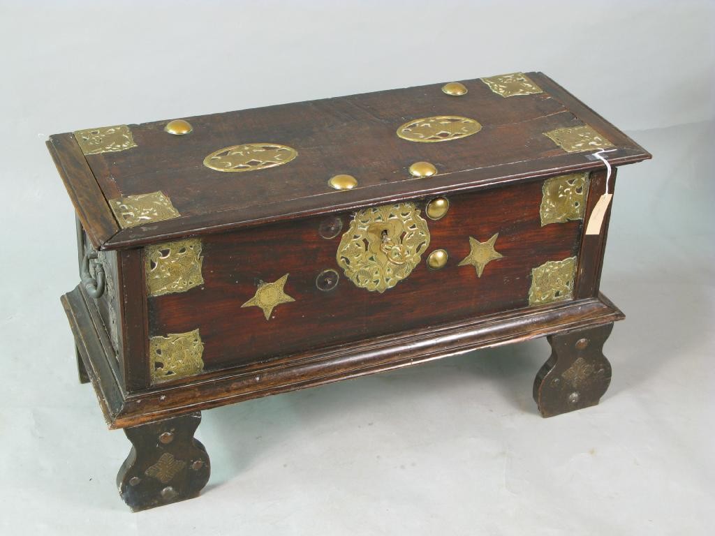 Appraisal: A th Century eastern hardwood chest with elaborate engraved brass