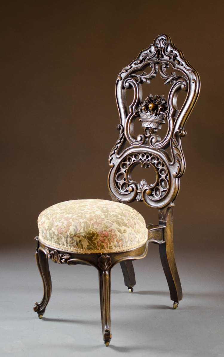 Appraisal: HIGHLY CARVED WALNUT HALL CHAIR Louis XV substyle American c