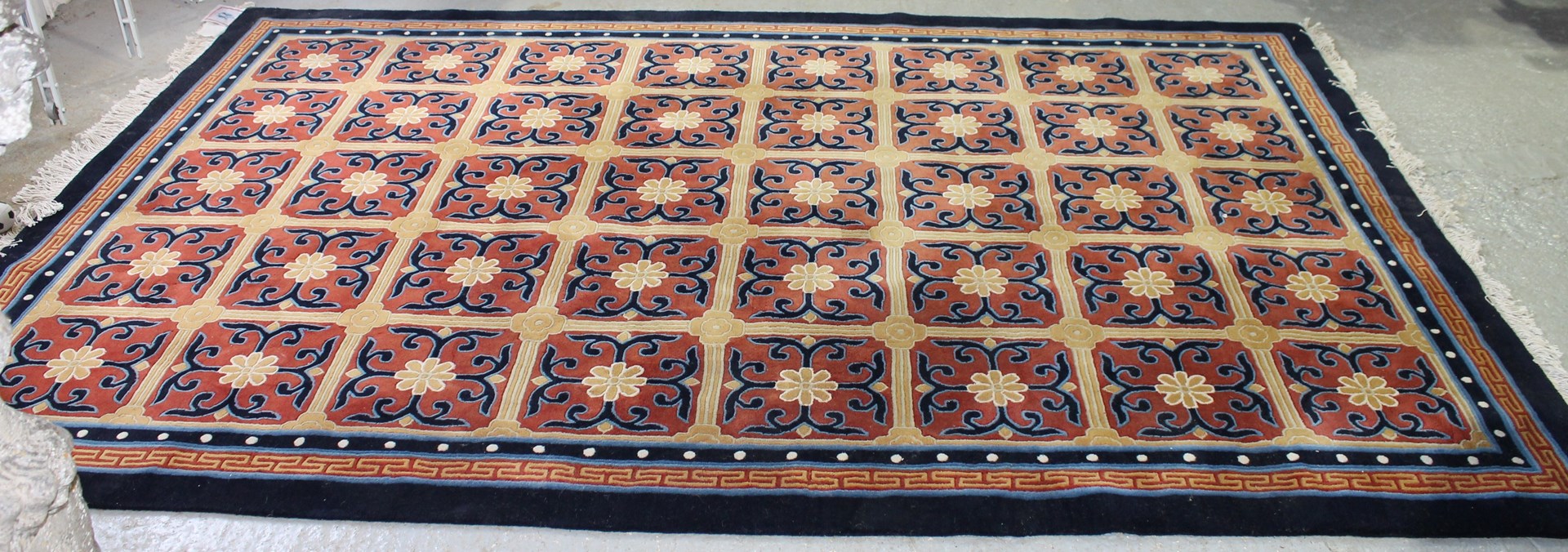 Appraisal: A Chinese carpet the madder field with a gold trellis