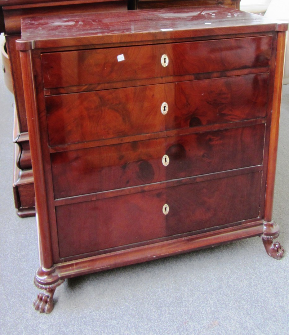 Appraisal: An early th century continental mahogany four drawer commode with