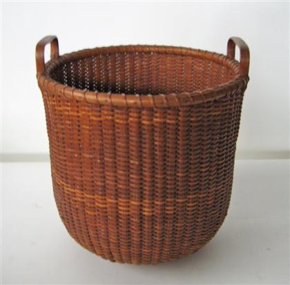 Appraisal: Large Nantucket two handled basket jose hormoso reyes nantucket island