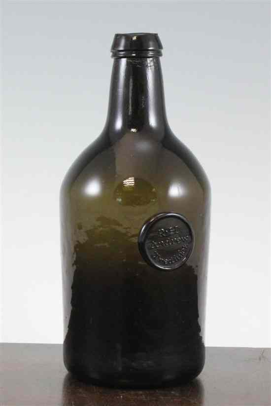 Appraisal: A Cornish glass sealed wine bottle c the squat cylindrical