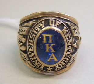 Appraisal: An American gold and cabochon blue paste set ring detailed