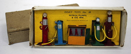 Appraisal: A DINKY TOYS NUMBER PETROL PUMPS AND OIL BIN in