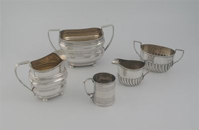 Appraisal: A small modern part fluted cream jug and sugar bowl