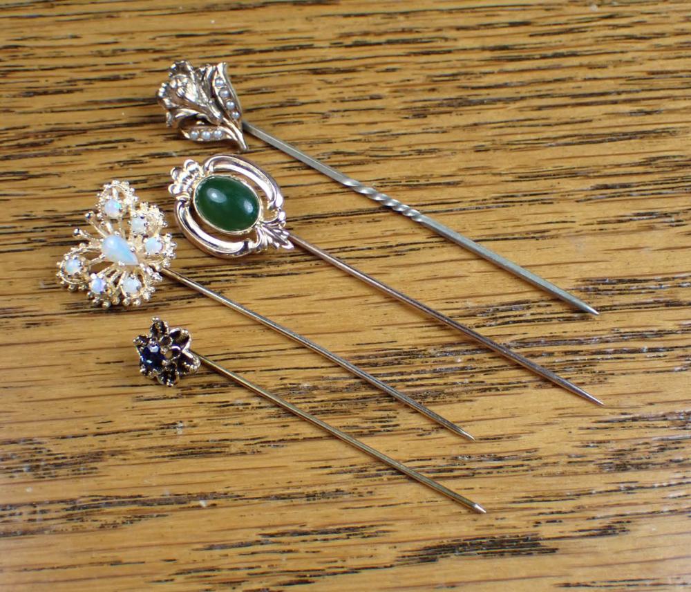 Appraisal: COLLECTION OF FOUR YELLOW GOLD STICK PINS k gold butterfly