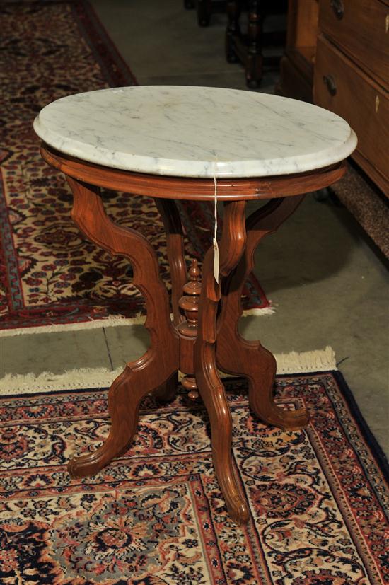 Appraisal: VICTORIAN LAMP TABLE Oval marble top on a conforming walnut