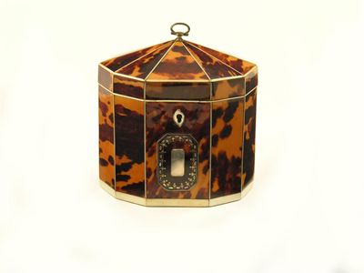 Appraisal: A George III tortoiseshell and ivory strung decagonal tea caddy