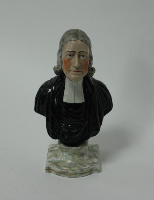 Appraisal: A Staffordshire pottery bust of Rev John Wesley cm high