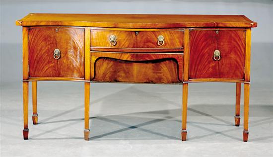 Appraisal: Georgian mahogany serpentine sideboard crossbanded top over two drawers flanked