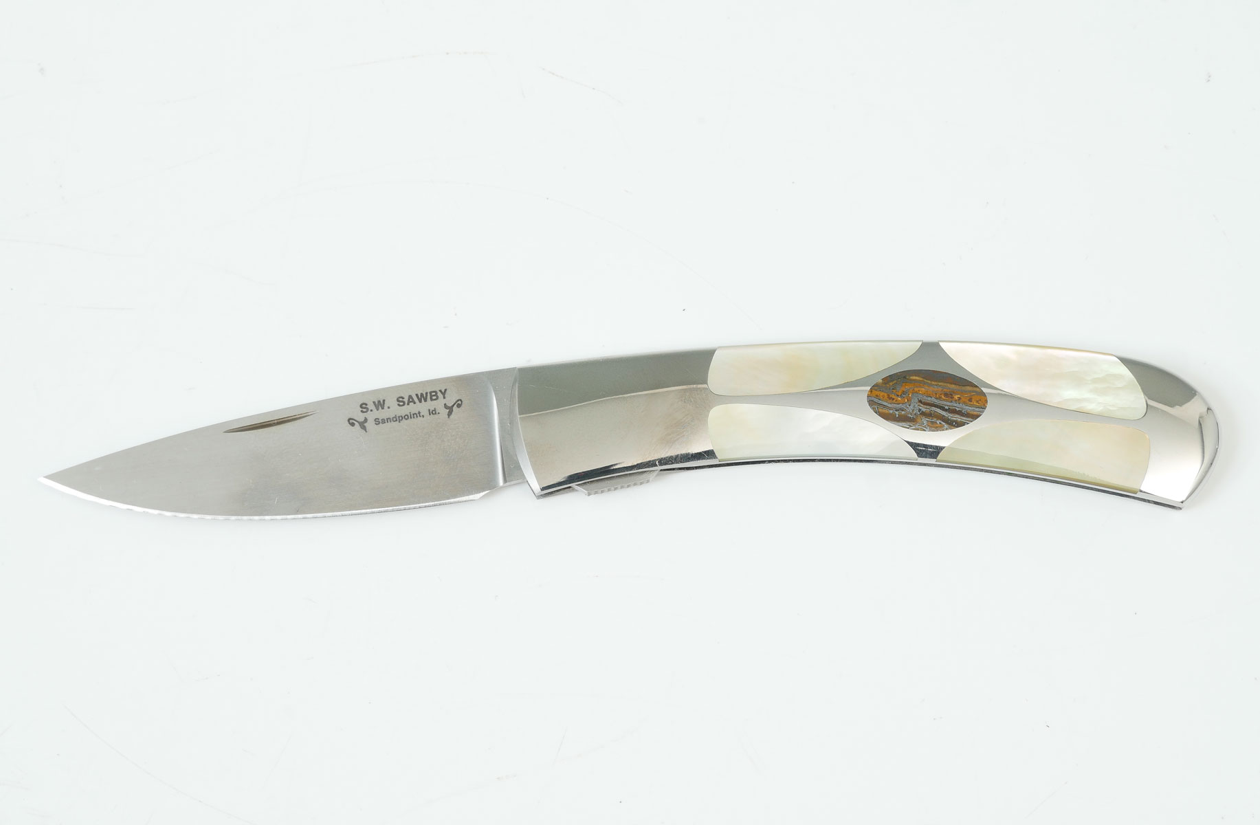 Appraisal: S W SCOTT SAWBY FOLDER WITH MOP INLAY Polished stainless