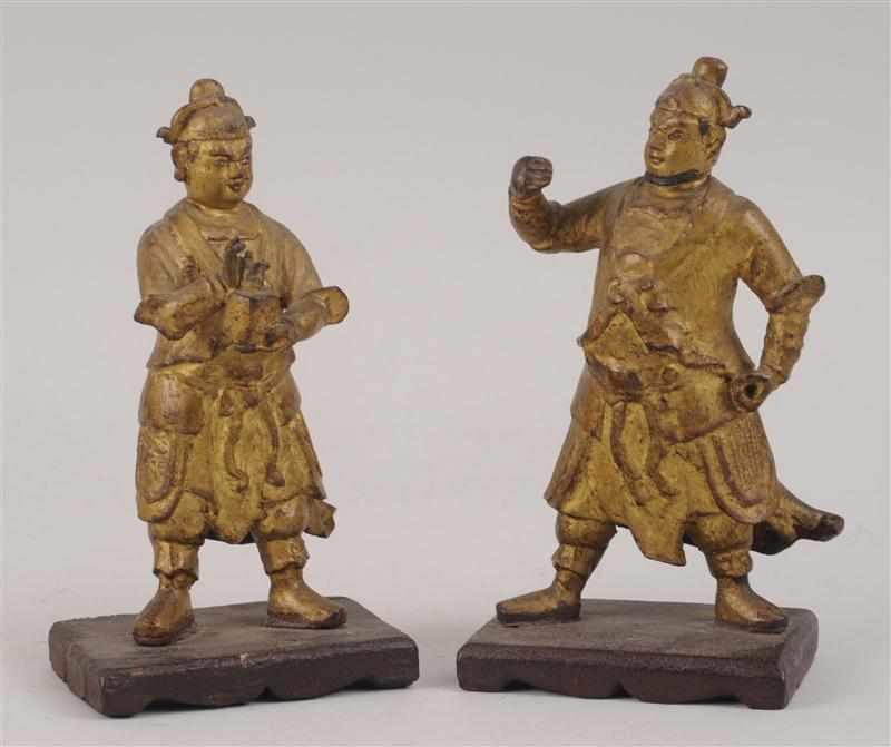 Appraisal: PAIR OF CHINESE MING GILT-METAL FIGURES The one holding a