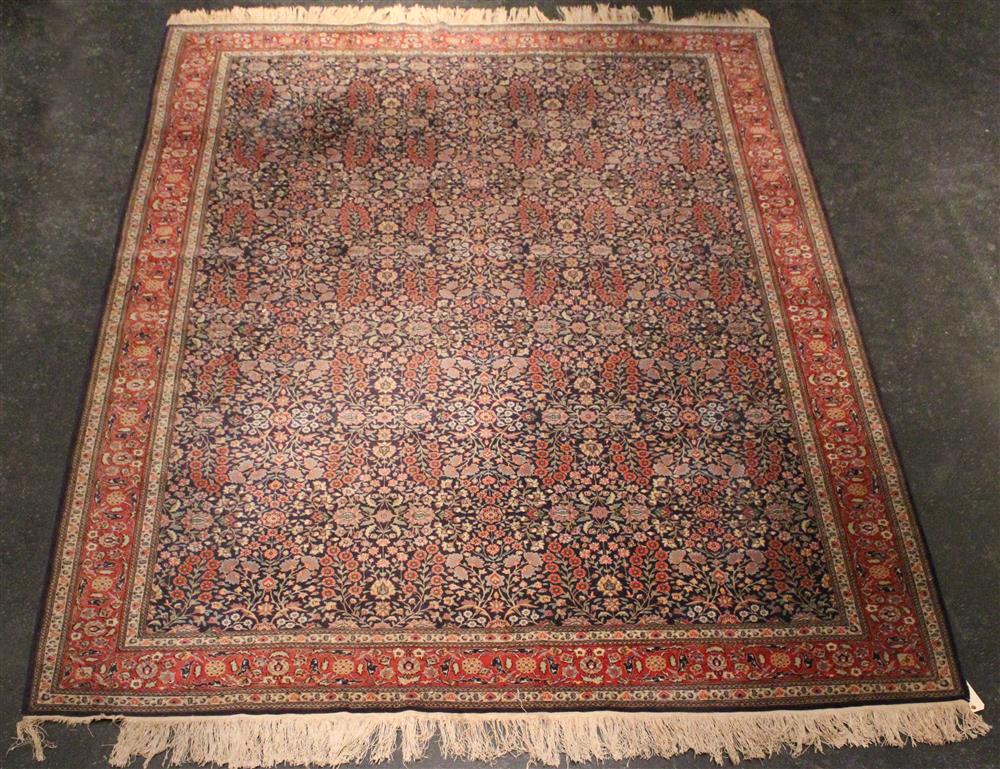 Appraisal: LARGE INDO-PERSIAN FLORAL DESIGN WOOL RUG floral repeating design on