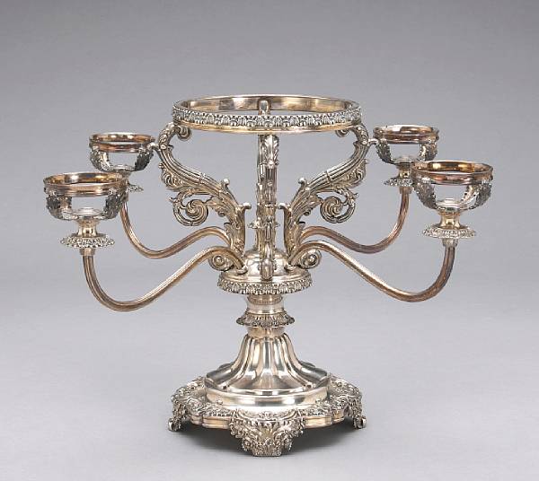 Appraisal: A Sheffield plate four arm epergne frame lacking glass fittingsSecond