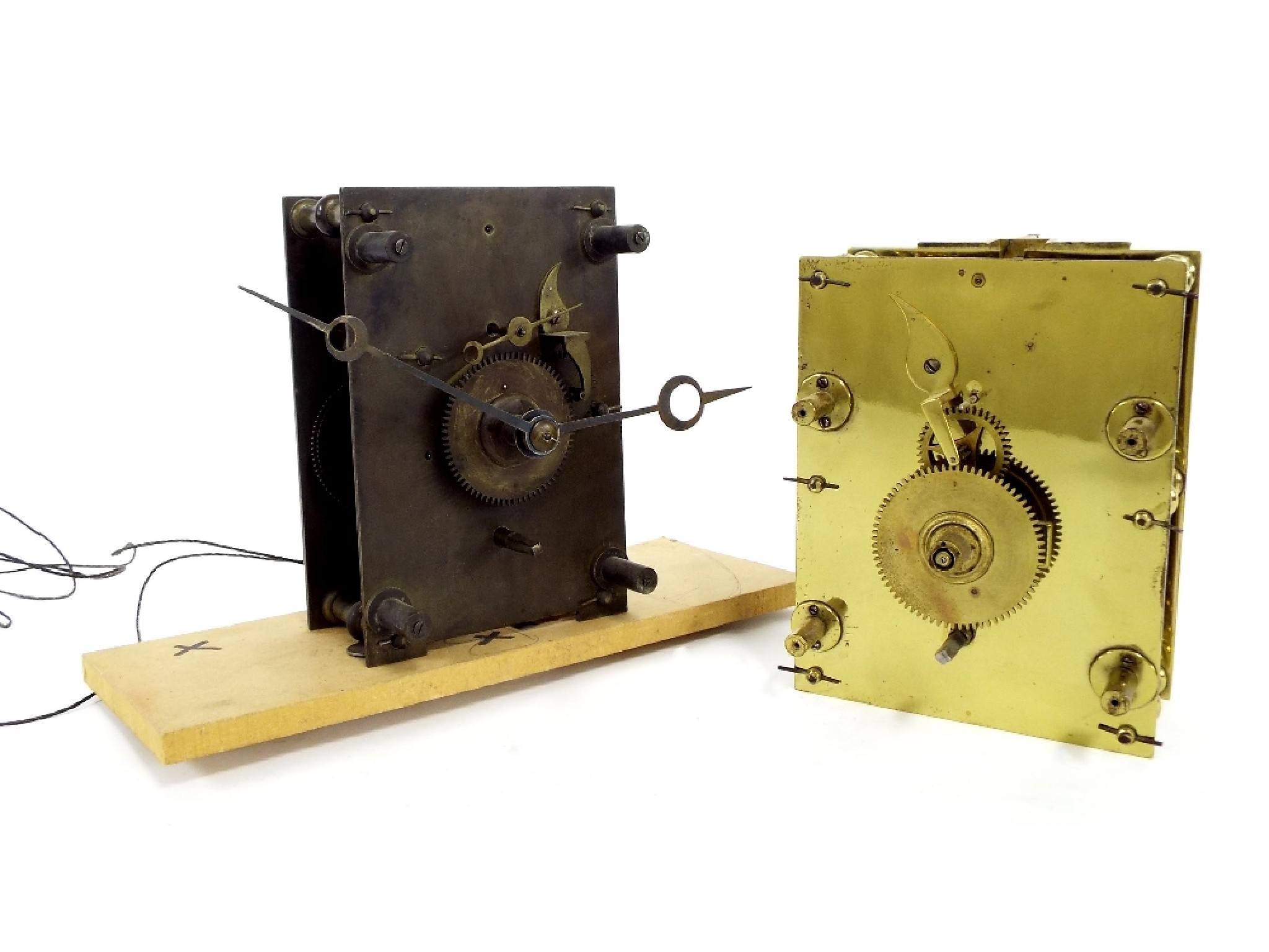 Appraisal: Two six pillar regulator clock movements both with deadbeat escapement