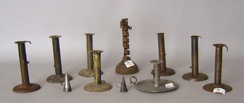 Appraisal: Nine tin and iron candlesticks to include hogscrapers th th