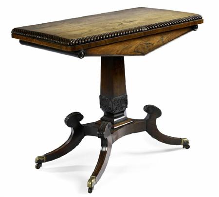 Appraisal: A Regency rosewood card table the rectangular foldover top with