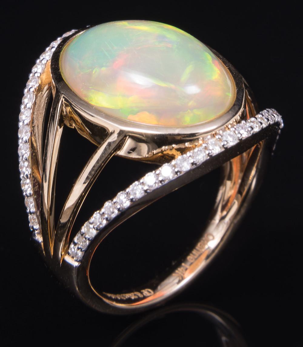 Appraisal: kt Yellow Gold Opal and Diamond Ring center bezel set