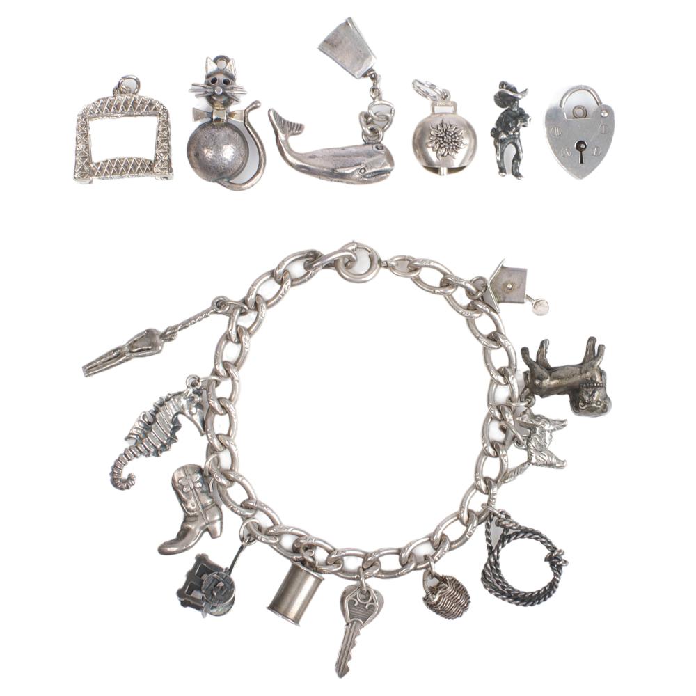 Appraisal: VINTAGE STERLING SILVER CHARM BRACELET PLUS SIX ADDITIONAL CHARMS L