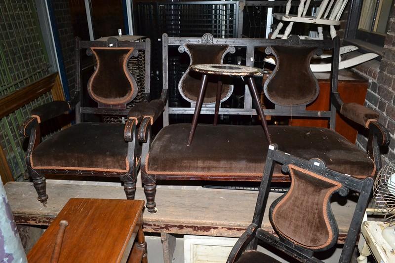 Appraisal: AN EDWARDIAN SETTEE IN BROWN UPHOLTERY AND TWO SINGLE CHAIRS