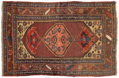 Appraisal: Kurdish rug serrated diamond central medallion on light purple ground