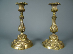 Appraisal: A pair of Continental Louis XV style gilt brass candlesticks