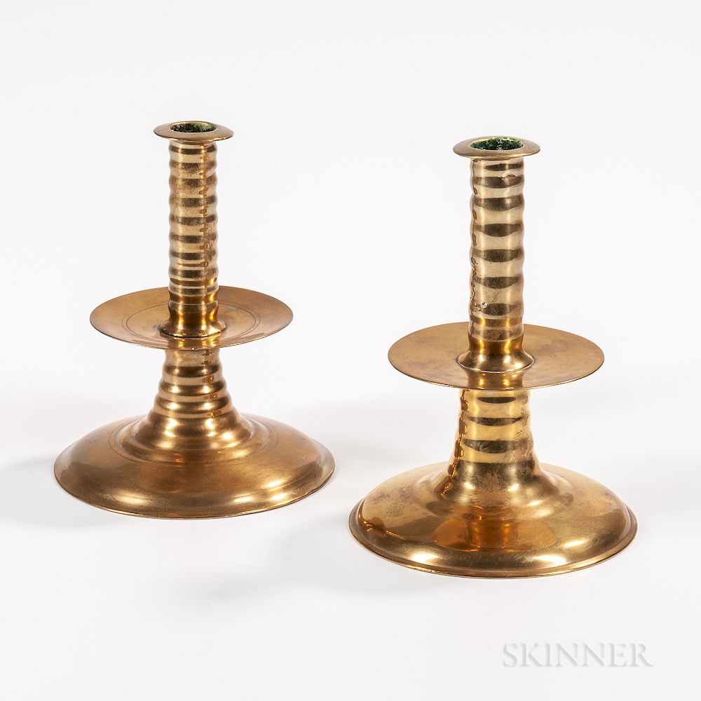 Appraisal: Two English Trumpet-base Mid-drip Candlesticks Two English Trumpet-base Mid-drip Candlesticks