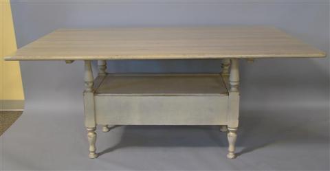 Appraisal: WHITEWASH DINING TABLE The rectangular top over turned legs with