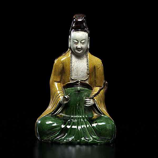 Appraisal: Chinese Sancai Guanyin Chinese th century A polychrome earthenware figure