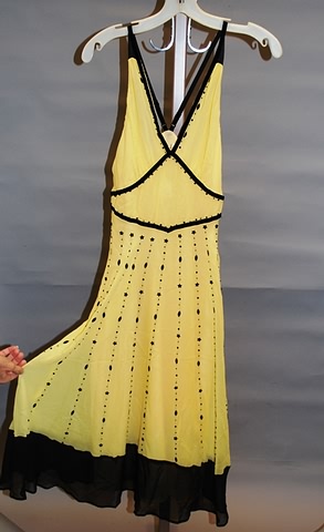 Appraisal: Yellow Silk with black beading black at hem and shoulder