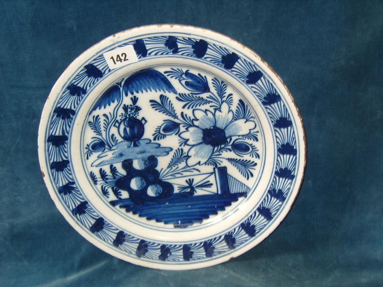 Appraisal: An th century Delft dish with blue and white painted