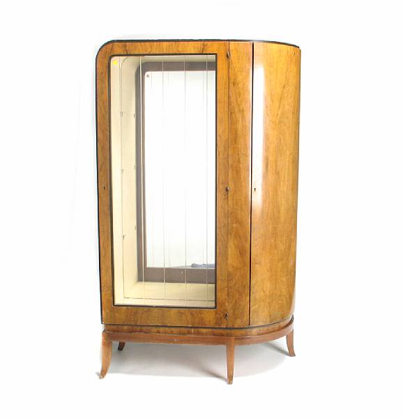 Appraisal: An Art Deco walnut veneered vitrine with glazed door height