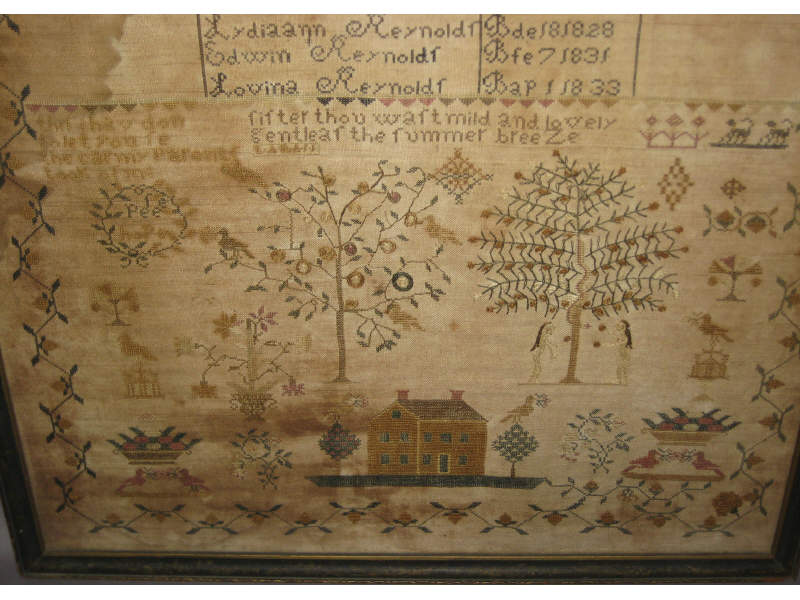 Appraisal: AMERICAN TH CENTURY FRAMED SAMPLER Elaborately decorated with Adam Eve