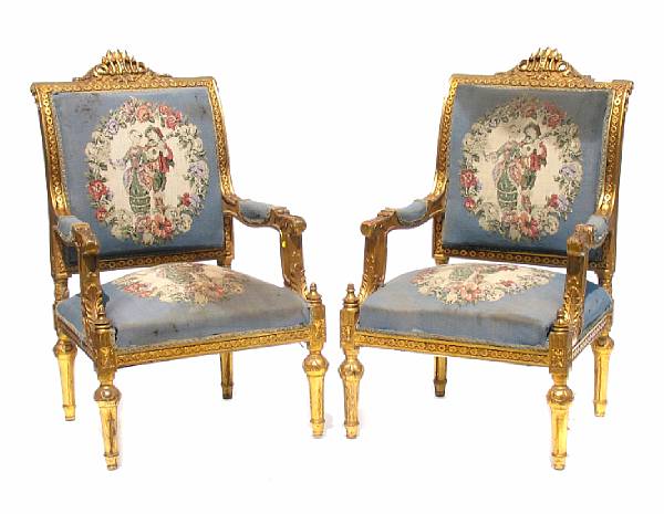 Appraisal: A pair of Louis XVI style upholstered armchairs height in