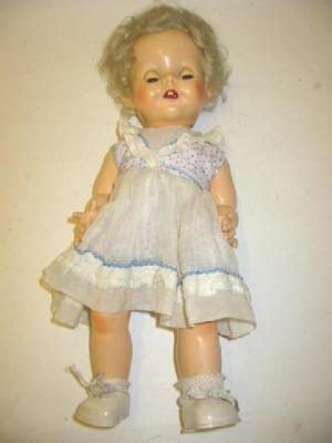 Appraisal: A Pedigree plastic doll with sleeping eyes blonde mohair wig