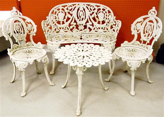 Appraisal: Garden Furniture A four-piece cast iron garden set Bench two