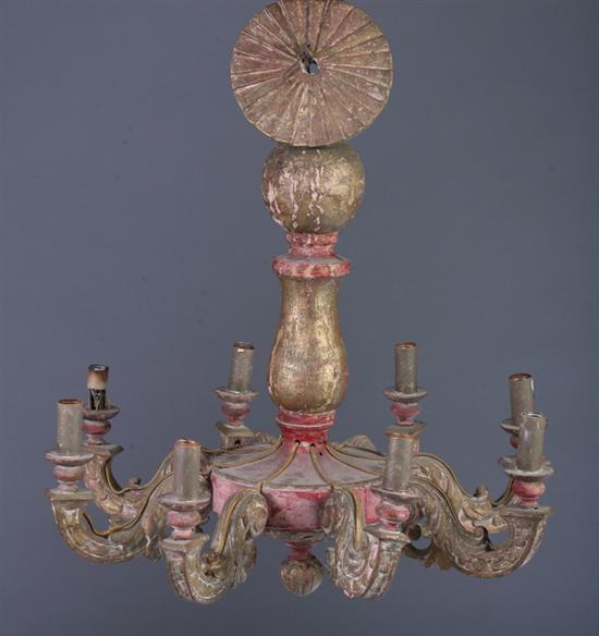 Appraisal: RENAISSANCE REVIVAL CARVED WOOD EIGHT-LIGHT CHANDELIER th century with painted