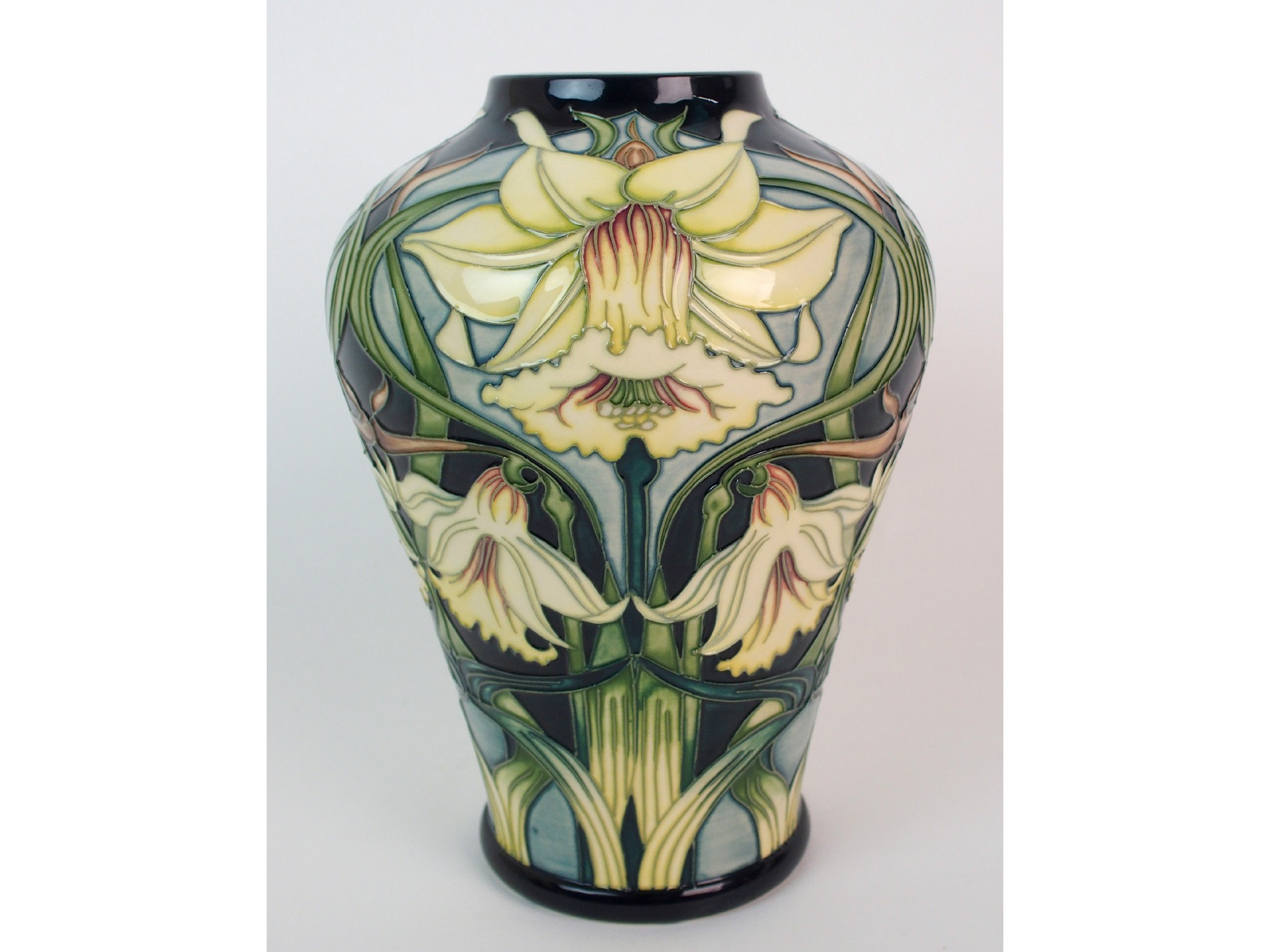 Appraisal: A Moorcroft Pottery Wordsworth Daffodils pattern vase designed by Rachel