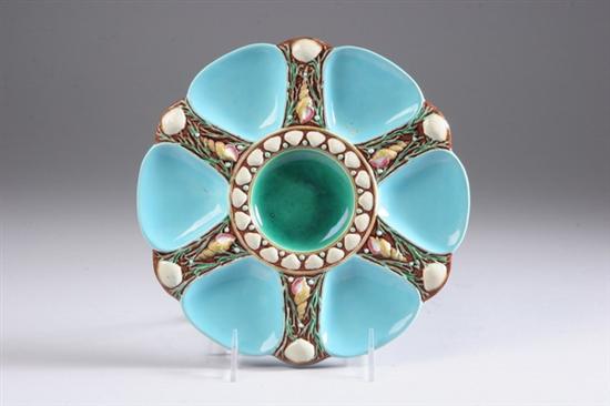 Appraisal: MINTON MAJOLICA OYSTER PLATE impressed Minton mark Centered with green