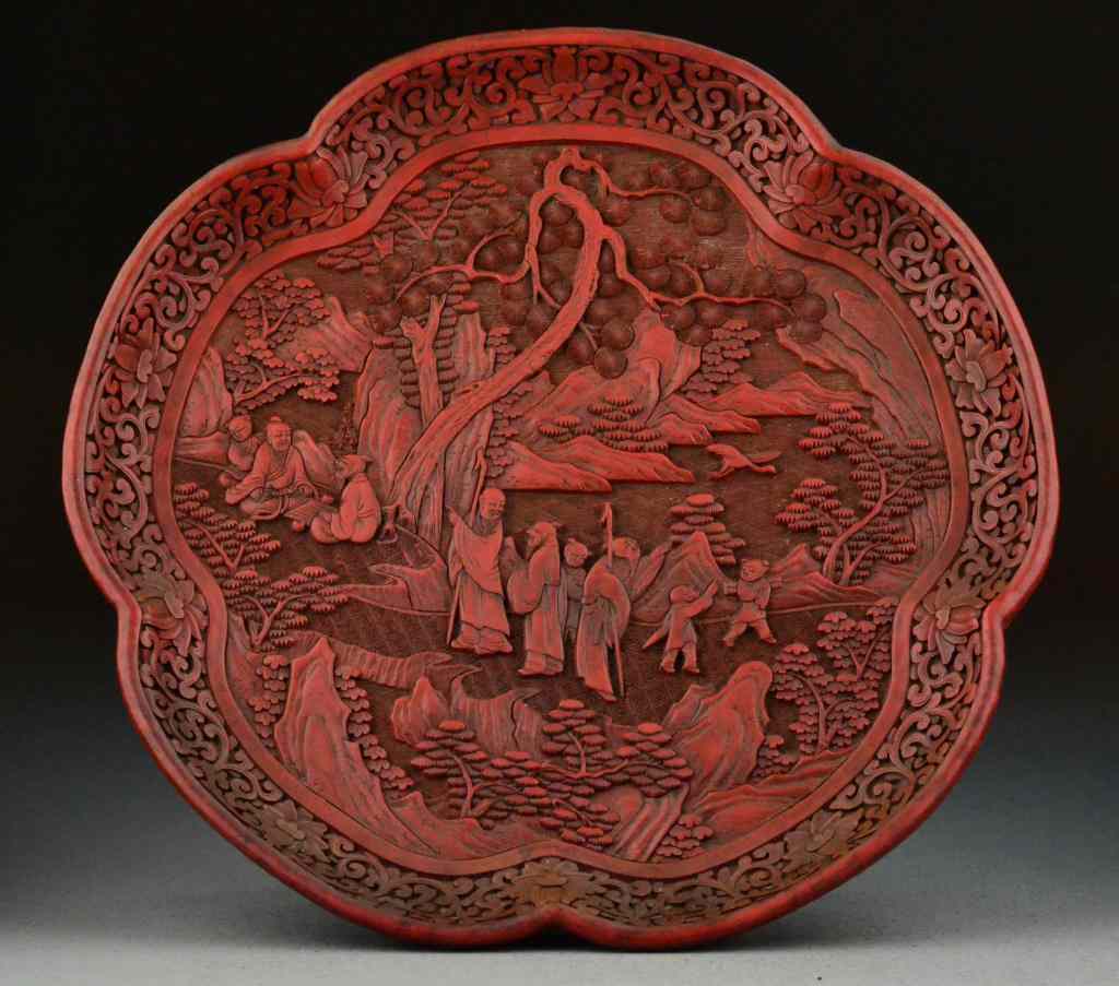 Appraisal: Chinese Qing Carved Cinnabar Lotus PlateVery finely carved in the