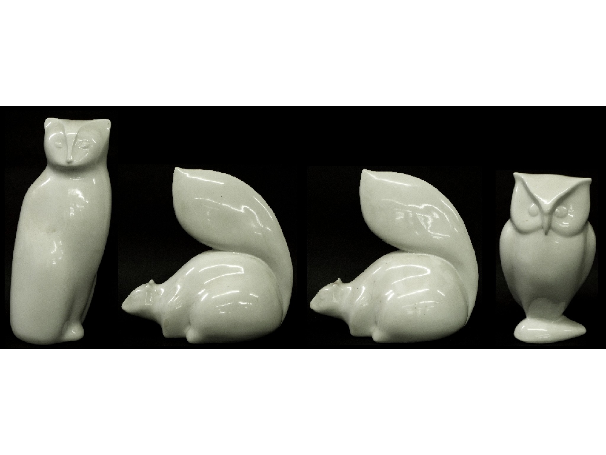 Appraisal: Goebel blanc de chine pair of squirrels owl and seated