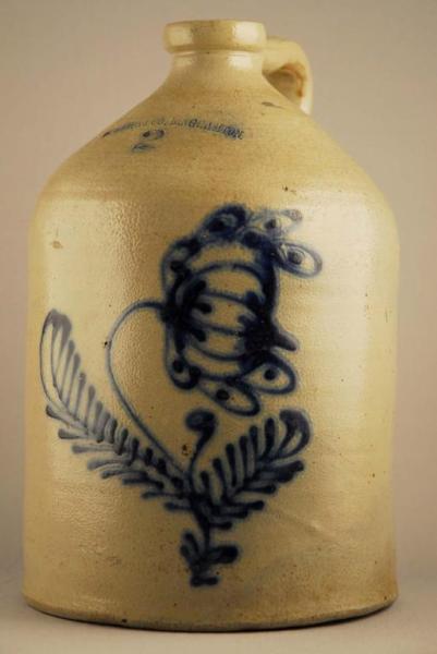 Appraisal: White Co -Gallon Handled Stoneware Crock Description Blue flower detail